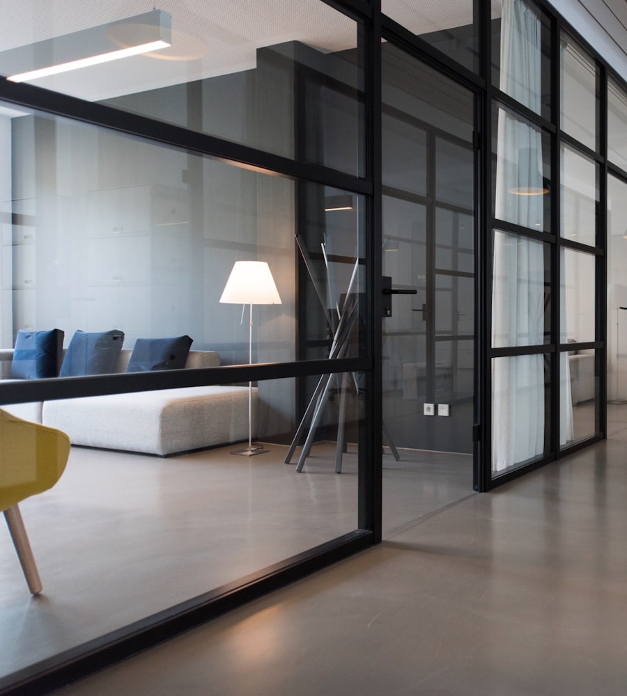 Professional office workspace with meeting area and natural light