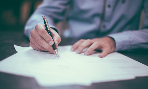 Person completing and signing tender documentation